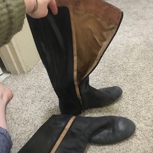 Tall black boots